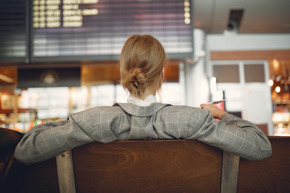 Woman sitting at the airport