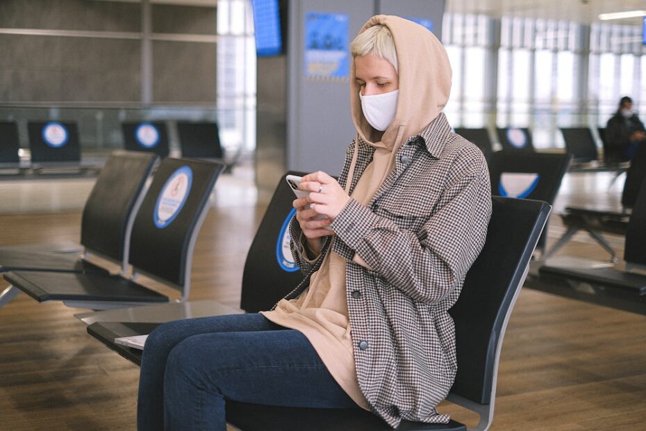 A woman is waiting for her flight