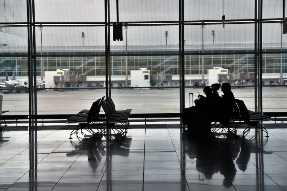 People waiting for their flight at the gate